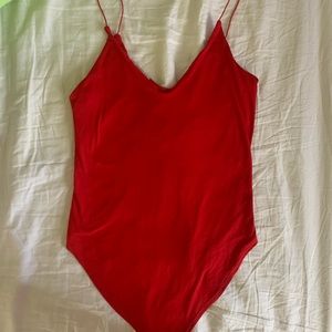Red body suit